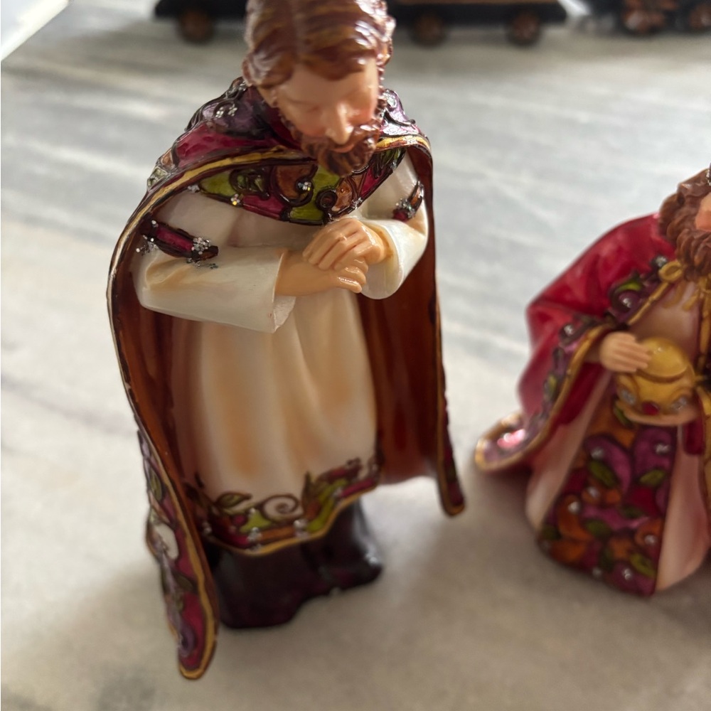 6 painted Christmas’s figurines look likes stained glassss rich looking